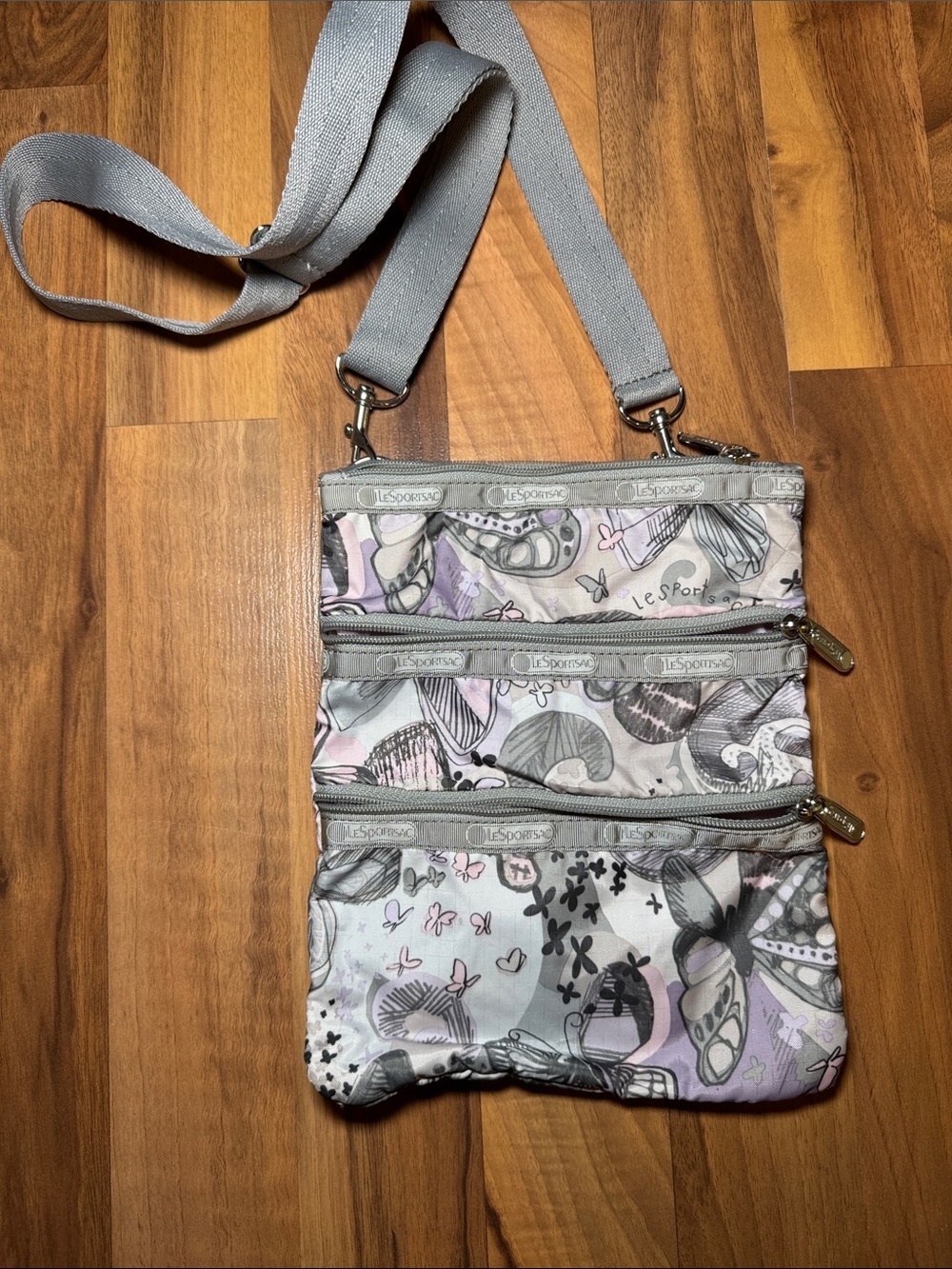 Lesportsac Gray and Lavender Patterned Triple-Zip Crossbody